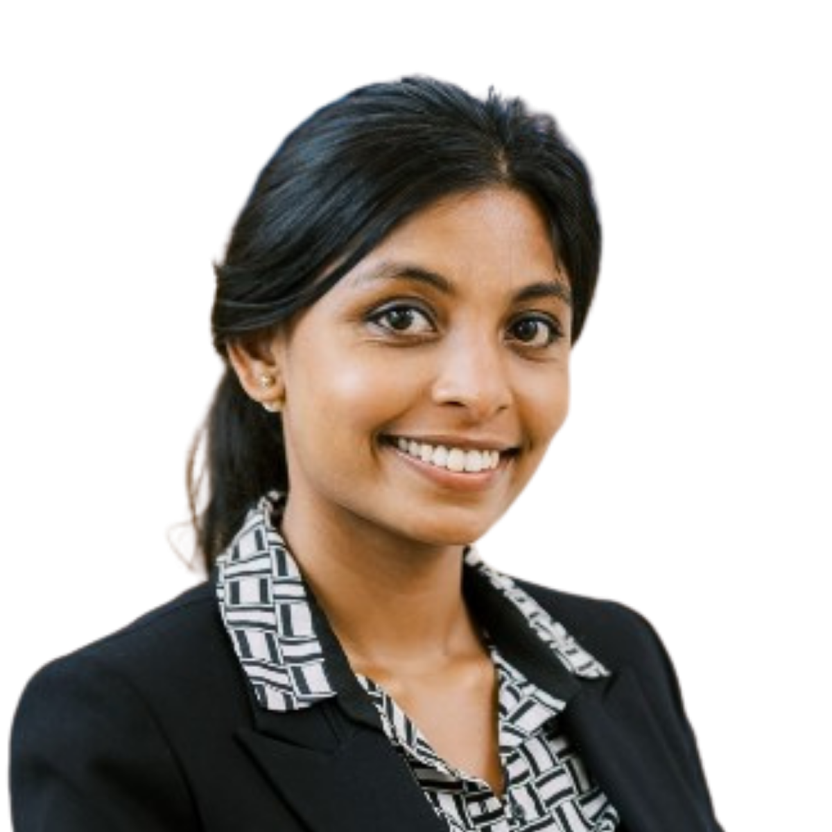 Professional headshot of a smiling female healthcare practitioner in business attire